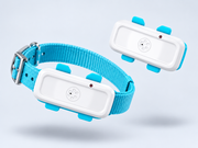 Two white petZeye GPS 911 cat trackers shown at different angles