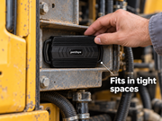 petZeye GPS 935 tracker positioned in a narrow compartment inside a machine