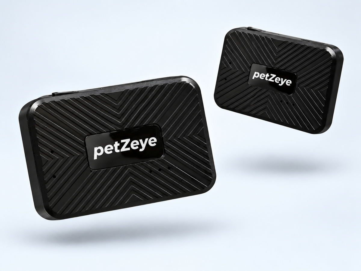 Two compact petZeye GPS 913 trackers shown at different angles