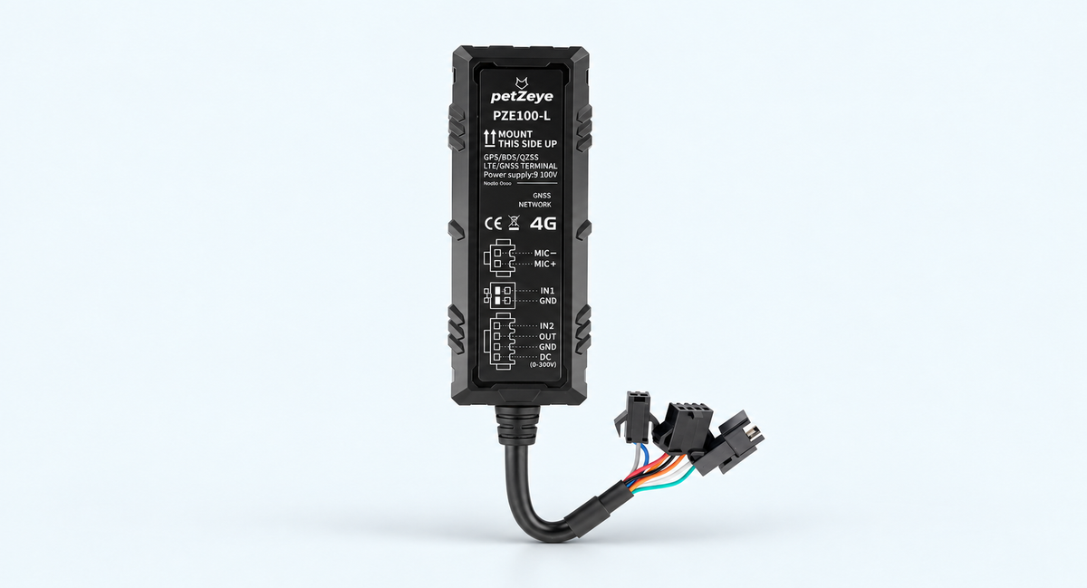 petZeye PZE100-L wired GPS tracker with its cables and connectors on a light background