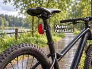 Water droplets on a petZeye GPS 906 bicycle tracker mounted beneath the saddle